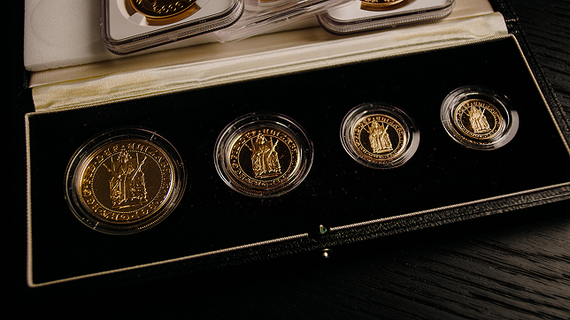 Specialist examining a coin collection for probate valuation