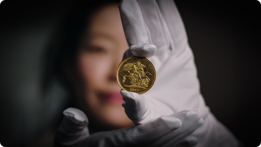 Specialist valuing a rare coin collection